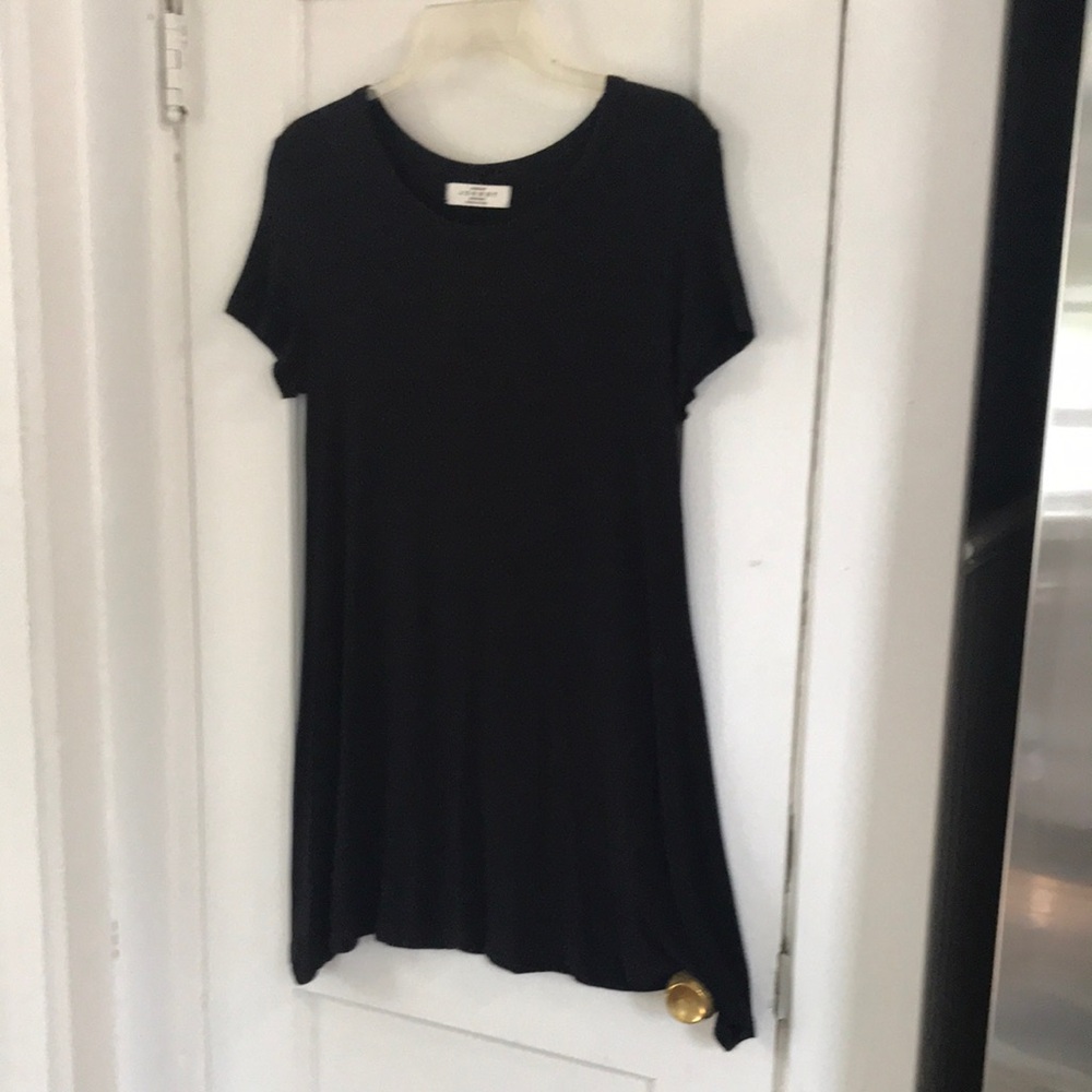 Black Short Sleeve Swing Dress by Johnny sz medium. Lots of stretch to it.